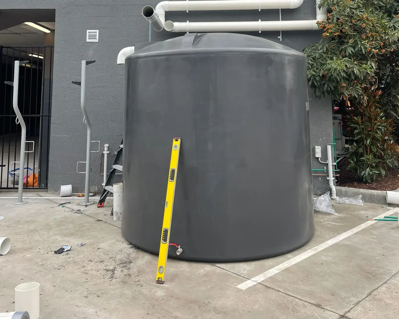 Rainwater tank and downpipes installed at a Melbourne property