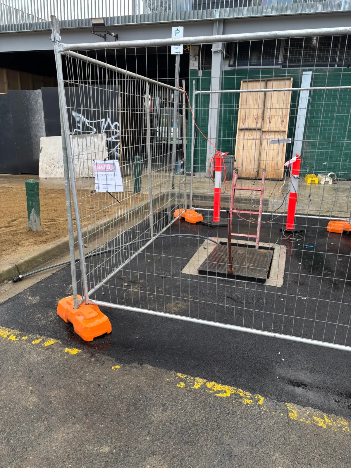 Completed in-ground stormwater tank with the lid set before the surface is reinstated