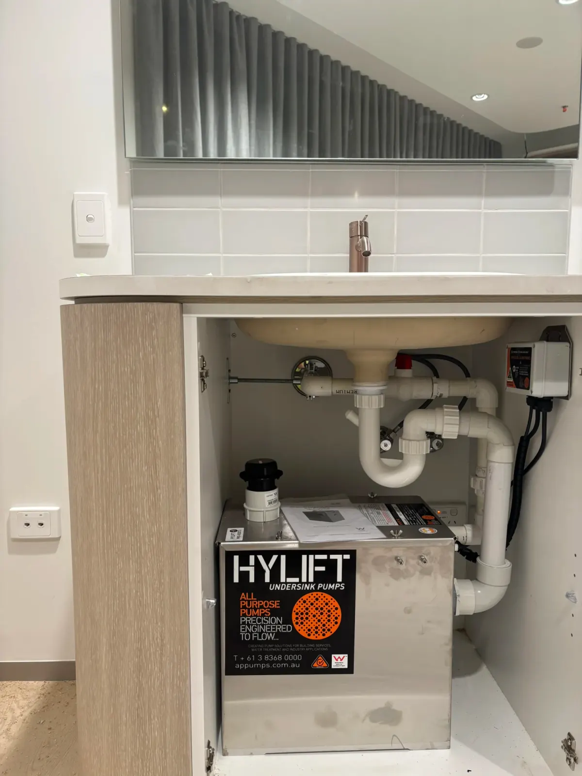 Under-counter sewage pump